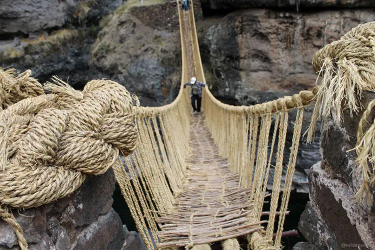 Travelers exploring Q'eswachaka Bridge and the remote southern Andes, experiencing authentic Cusco off the beaten path adventures in Peru.