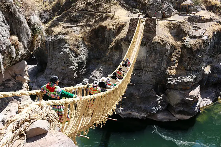 Travelers exploring Q'eswachaka Bridge and the remote southern Andes, experiencing authentic Cusco off the beaten path adventures in Peru.