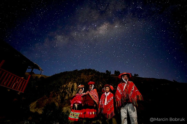 Astrophotographer capturing the Milky Way over the Andes in Peru, one of the country's best astrophotography locations with pristine dark skies.