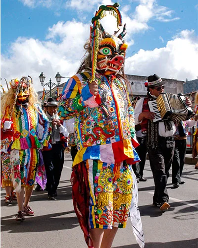 why paucartambo festival is important peru Traditional dancers performing during the Paucartambo Festival in Cusco, Peru, celebrating centuries-old Andean traditions and the Virgen del Carmen.