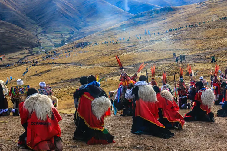 Qoyllur Rit'i Pilgrimage in Peru through the sacred Sinakara Valley with Andean pilgrims and traditional dancers.