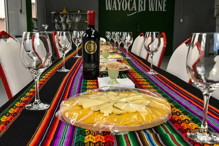 Huayoccari Wine served with traditional local food in the Sacred Valley of Cusco, Peru.